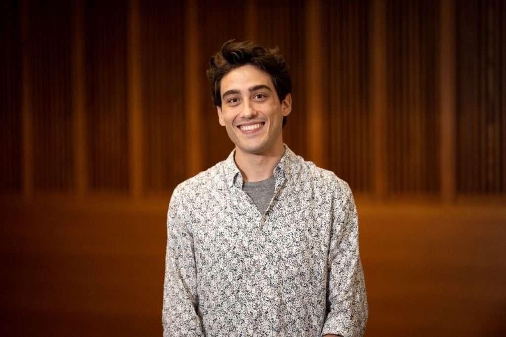 A color photograph of Wash U researcher Roger Michaelides