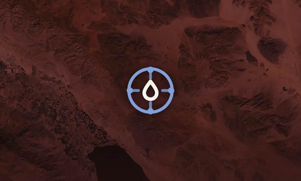 Blue circular target icon with a white water drop in the center over a red-tinted satellite map background.